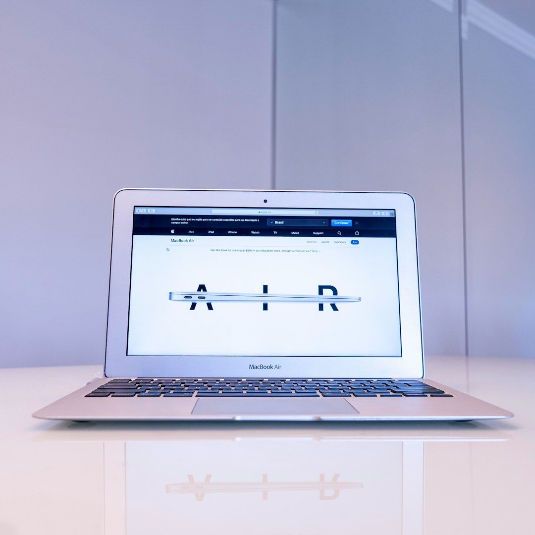 Laptop screen showing AI data dashboard with graphs