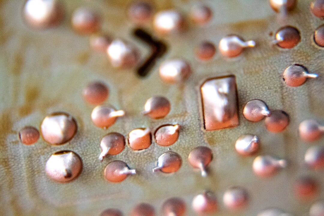 Macro photo of a glowing circuit board